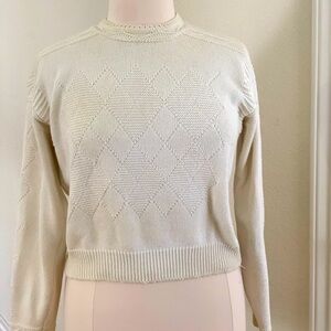 Liz Sport - cream colored, diamond and zig zag stitches highlight this sweater.